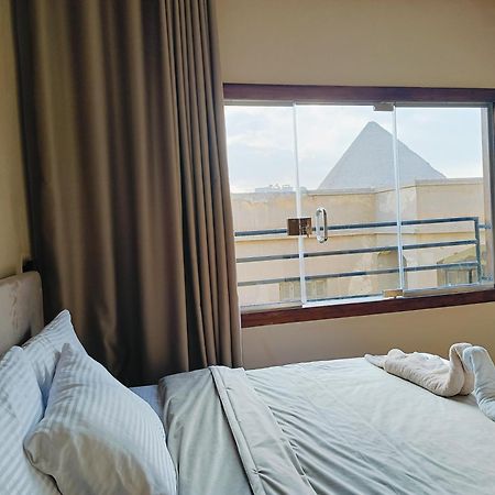 Magic Golden Pyramids View Hotel Kafret el-Gabal Buitenkant foto