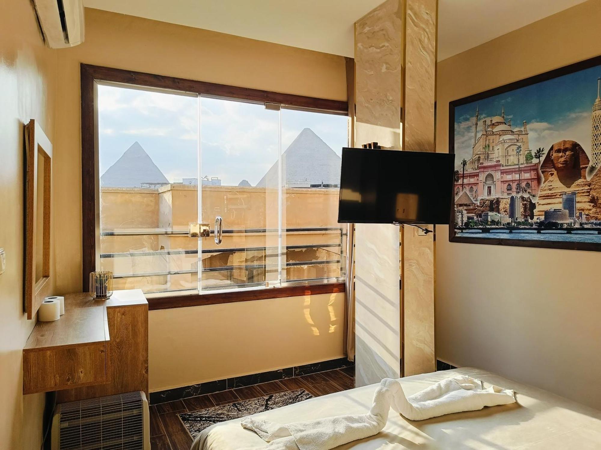 Magic Golden Pyramids View Hotel Kafret el-Gabal Buitenkant foto
