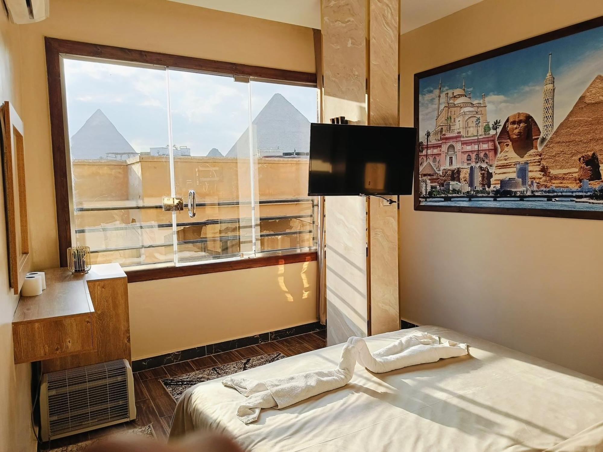 Magic Golden Pyramids View Hotel Kafret el-Gabal Buitenkant foto