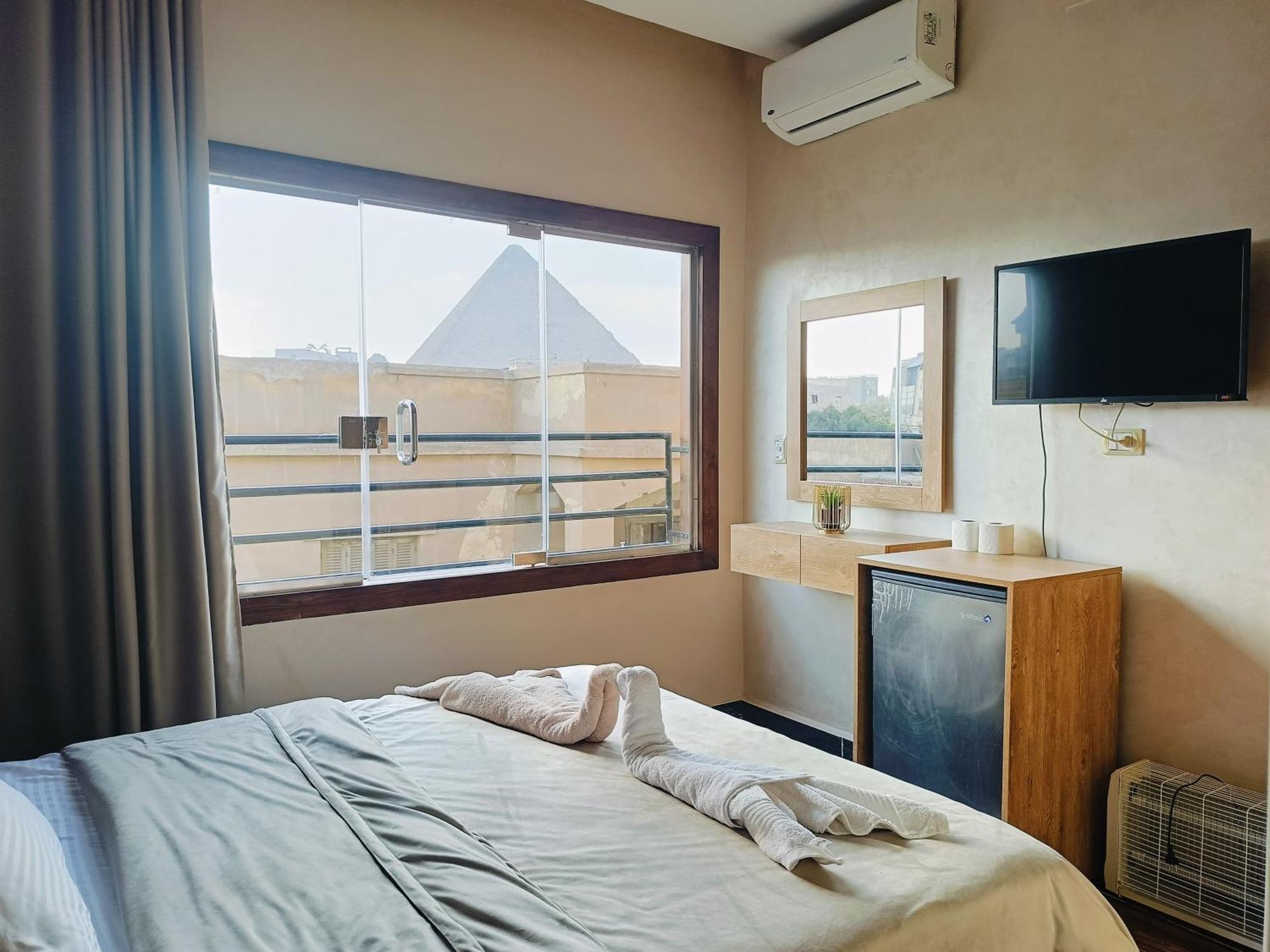 Magic Golden Pyramids View Hotel Kafret el-Gabal Buitenkant foto